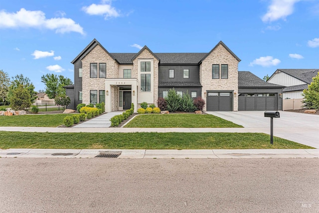 2664 N Yount Way, Eagle, ID 83616 - view of front facade featuring concrete driveway, roof with shingles, and a garage