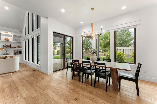 2664 N Yount Way, Eagle, ID 83616 - dining space with plenty of natural light, light wood finished floors, recessed lighting, a chandelier, and baseboards