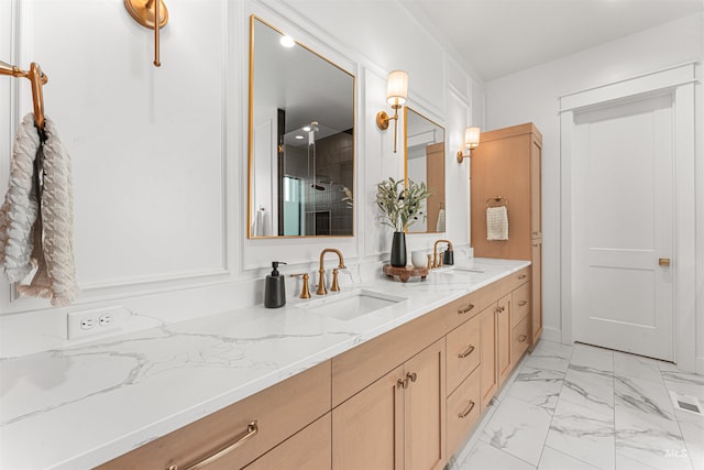 2664 N Yount Way, Eagle, ID 83616 - bathroom with double vanity, marble look tile flooring, and a shower with shower door
