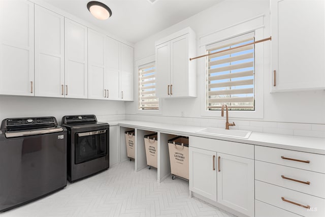 2664 N Yount Way, Eagle, ID 83616 - laundry area with cabinet space, separate washer and dryer, and light flooring