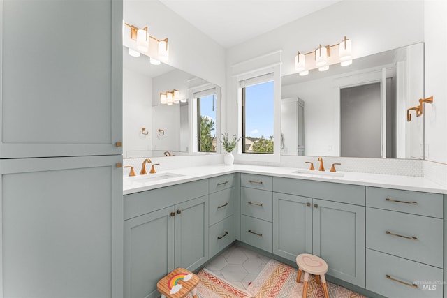 2664 N Yount Way, Eagle, ID 83616 - full bath featuring double vanity, backsplash, and tile patterned floors