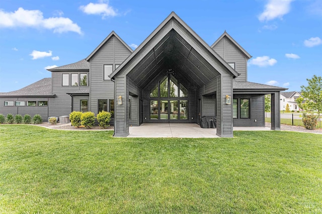 2664 N Yount Way, Eagle, ID 83616 - rear view of house featuring a patio, a shingled roof, and central air condition unit