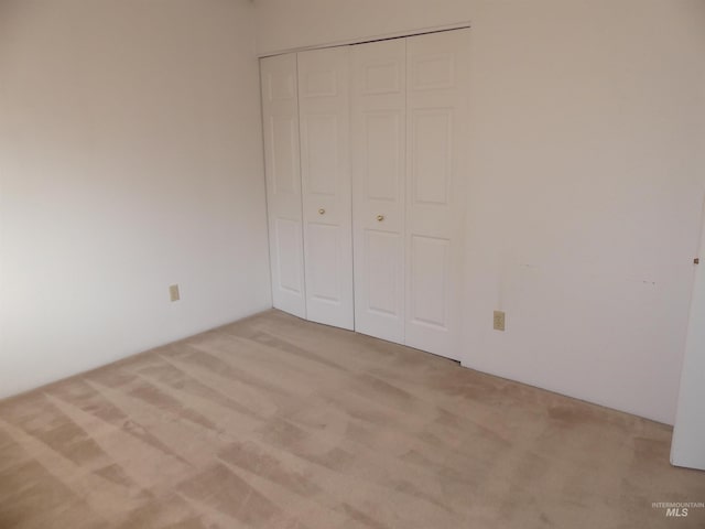 3213 5th St Unit A, Lewiston, ID 83501 - unfurnished bedroom with carpet floors and a closet
