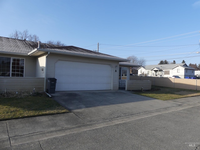 3213 5th St Unit A, Lewiston, ID 83501 - view of front of house with fence, driveway, and an attached garage