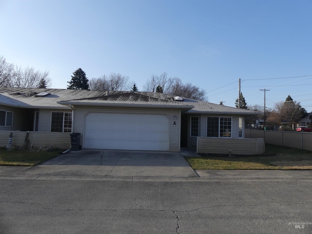 3213 5th St Unit A, Lewiston, ID 83501 - ranch-style house with fence, driveway, and an attached garage