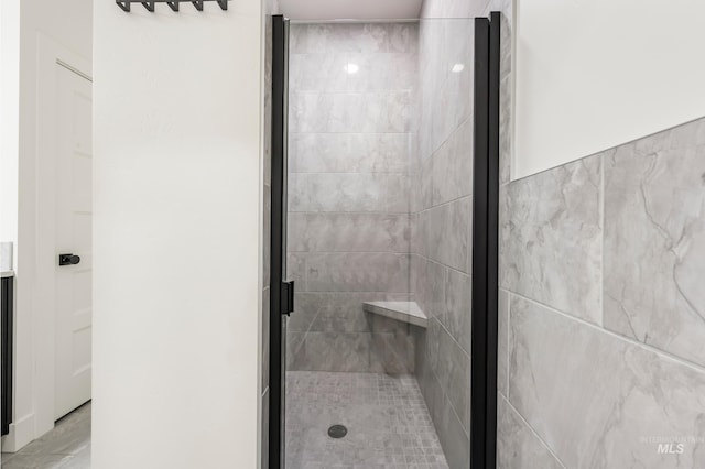 bathroom with a stall shower