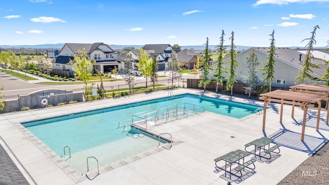 2349 E Valensole St, Meridian, ID 83642 - community pool featuring a residential view, fence, and a patio