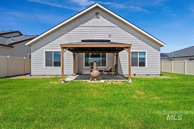 5006 Clearfield St, Caldwell, ID 83605 - back of house featuring a gazebo, a patio area, crawl space, and board and batten siding