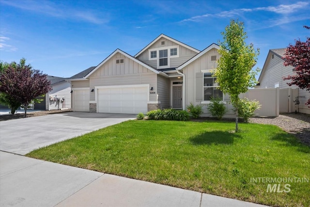 5006 Clearfield St, Caldwell, ID 83605 - view of front of house with board and batten siding, a garage, concrete driveway, and stone siding