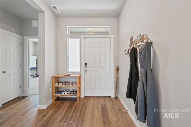 5006 Clearfield St, Caldwell, ID 83605 - entryway with wood finished floors and baseboards