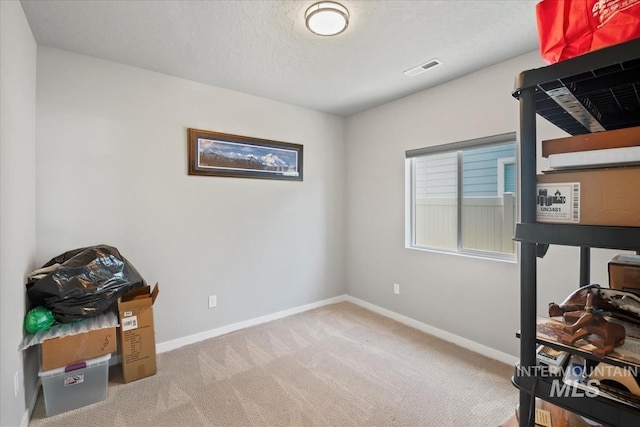 5006 Clearfield St, Caldwell, ID 83605 - carpeted bedroom featuring baseboards and a textured ceiling