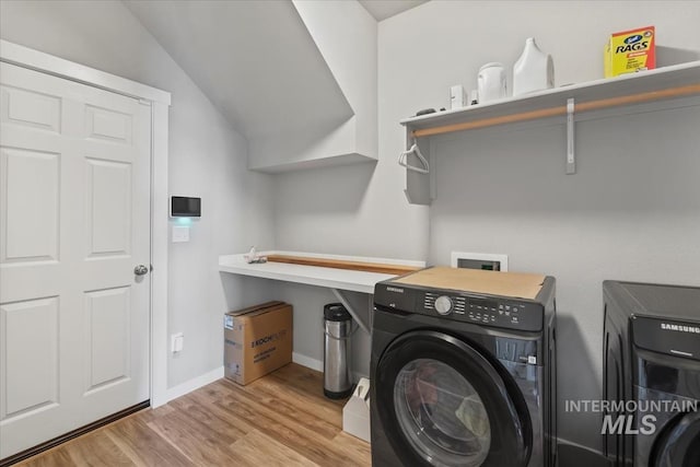 5006 Clearfield St, Caldwell, ID 83605 - laundry room with hookup for a washing machine, wood finished floors, and baseboards