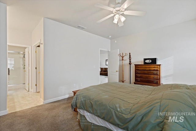 bedroom with ceiling fan and light carpet