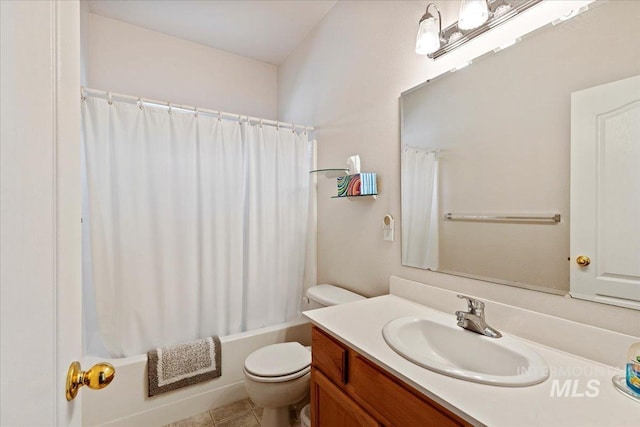 full bathroom featuring tile patterned flooring, vanity, shower / bath combination with curtain, and toilet