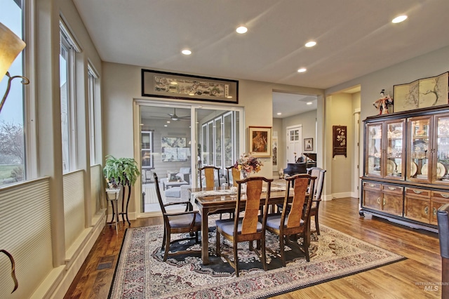 2468 E Lodge Trail Dr, Meridian, ID 83642 - dining room with wood finished floors, ceiling fan, baseboards, and recessed lighting