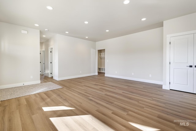 unfurnished room featuring light hardwood / wood-style flooring