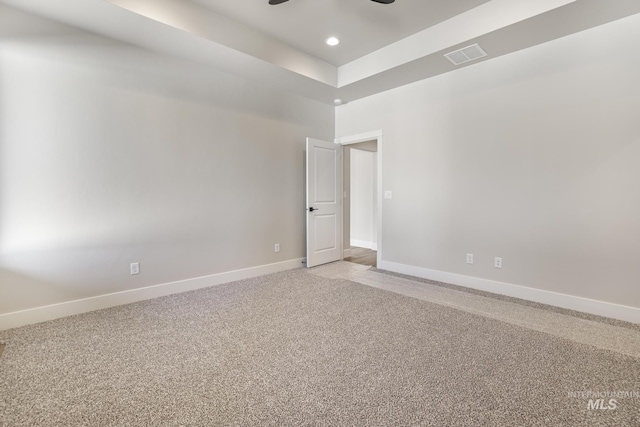 carpeted empty room with ceiling fan