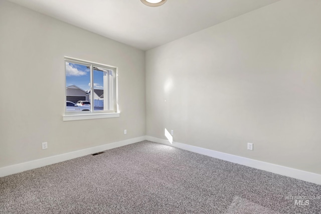 view of carpeted spare room