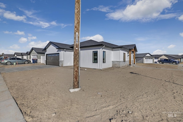 view of side of home featuring a garage