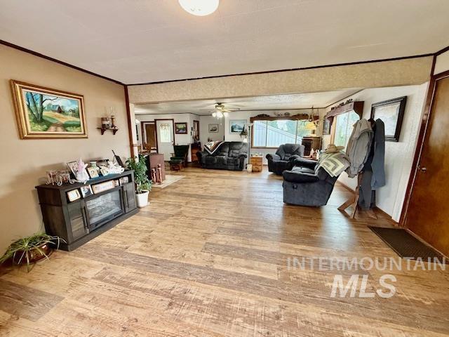 908 Pine St, Anatone, WA 99401 - living room featuring wood finished floors and a ceiling fan
