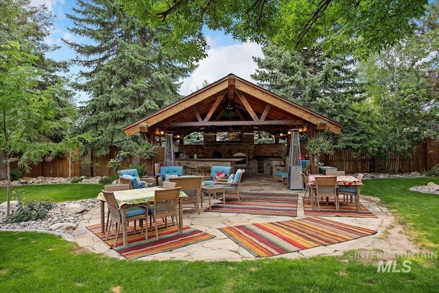 view of patio / terrace with a gazebo and an outdoor living space