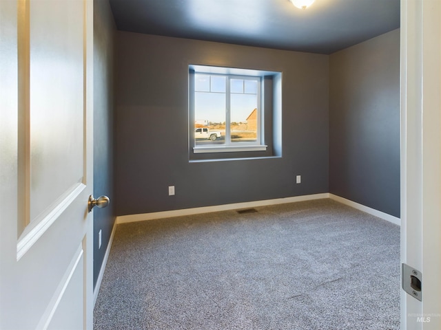 view of carpeted spare room