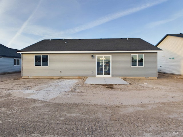 rear view of house featuring a patio