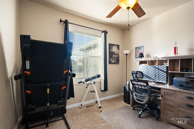 home office featuring ceiling fan and light colored carpet