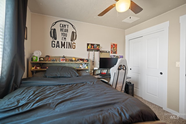 bedroom featuring a closet, ceiling fan, and carpet flooring