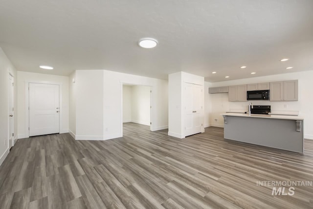 TBD Drum Ln Lot 3A, Parma, ID 83660 - unfurnished living room with baseboards, wood finished floors, and recessed lighting