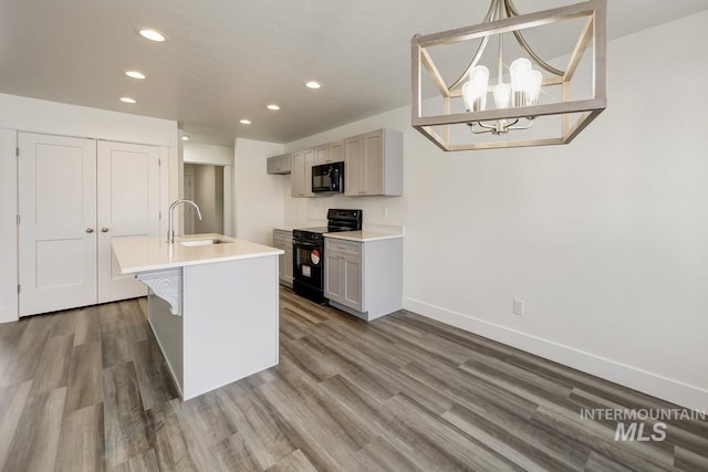 TBD Drum Ln Lot 3A, Parma, ID 83660 - kitchen featuring black appliances, a sink, baseboards, recessed lighting, and wood finished floors