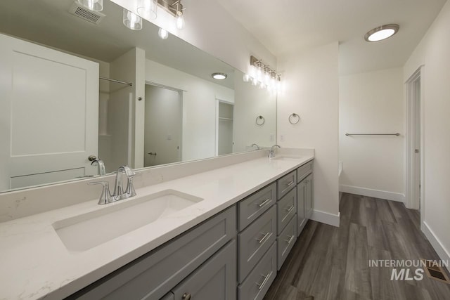 TBD Drum Ln Lot 3A, Parma, ID 83660 - full bath featuring double vanity, wood finished floors, and baseboards