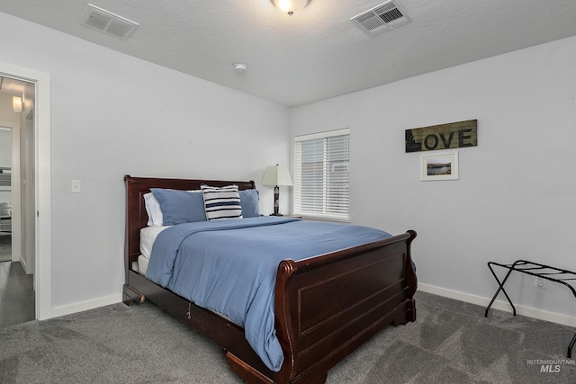 bedroom with carpet, baseboards, and visible vents