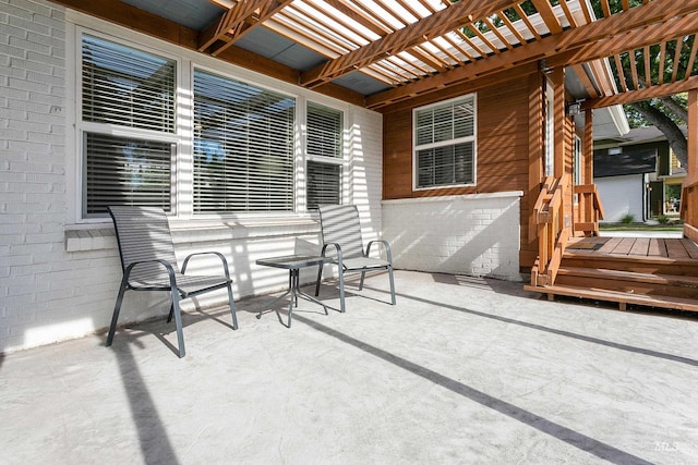view of patio featuring a pergola