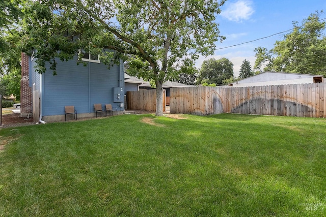 view of yard with fence