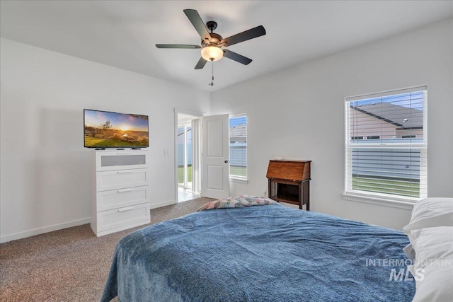1275 Terra Ave, Twin Falls, ID 83301 - carpeted bedroom featuring baseboards and a ceiling fan