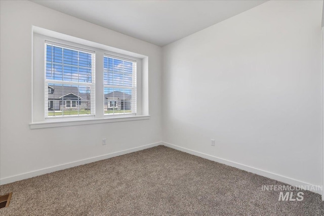1275 Terra Ave, Twin Falls, ID 83301 - carpeted empty room with baseboards