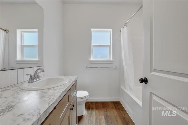 1275 Terra Ave, Twin Falls, ID 83301 - bathroom featuring vanity, wood finished floors, and shower / bath combo