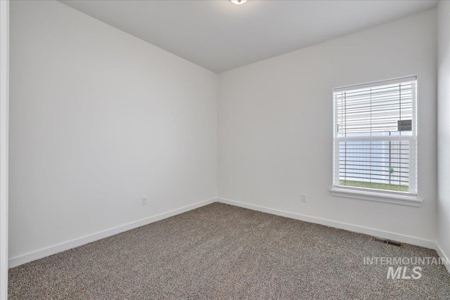 1275 Terra Ave, Twin Falls, ID 83301 - carpeted empty room featuring baseboards