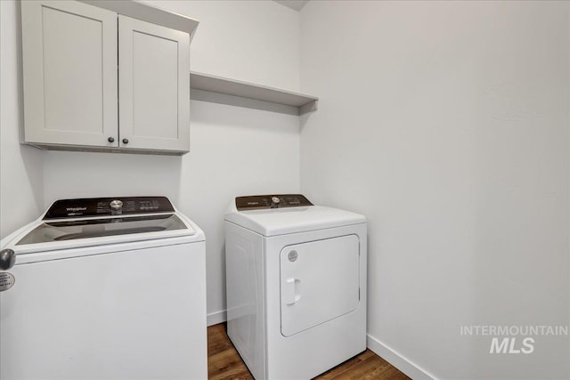 1275 Terra Ave, Twin Falls, ID 83301 - laundry room with independent washer and dryer, cabinet space, and dark wood-type flooring