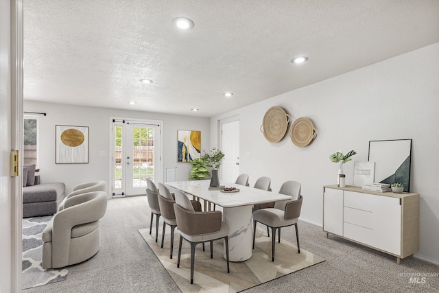 5457 S Oseola Pl, Boise, ID 83709 - dining area featuring light colored carpet, a textured ceiling, and recessed lighting