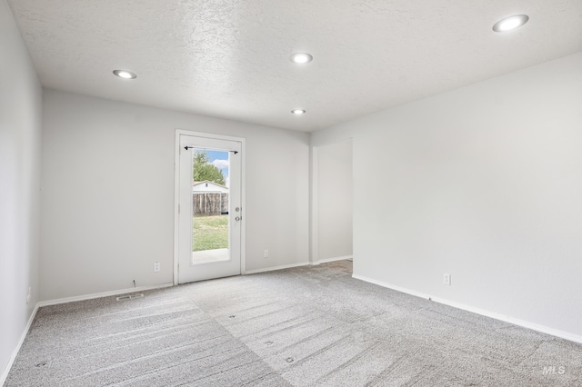 5457 S Oseola Pl, Boise, ID 83709 - carpeted empty room featuring recessed lighting, baseboards, and a textured ceiling