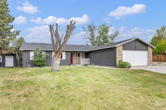 5457 S Oseola Pl, Boise, ID 83709 - view of front of house with concrete driveway, an attached garage, and brick siding