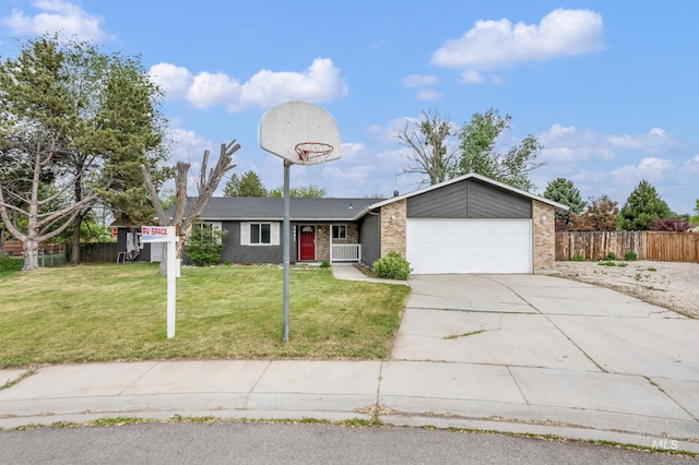 5457 S Oseola Pl, Boise, ID 83709 - view of front facade with brick siding, a garage, and concrete driveway