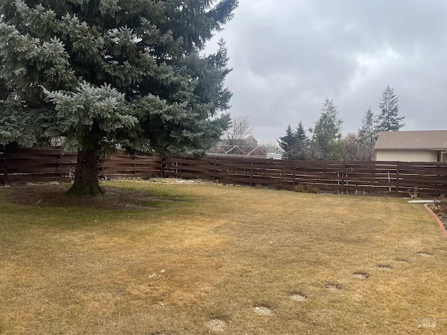 view of yard with fence