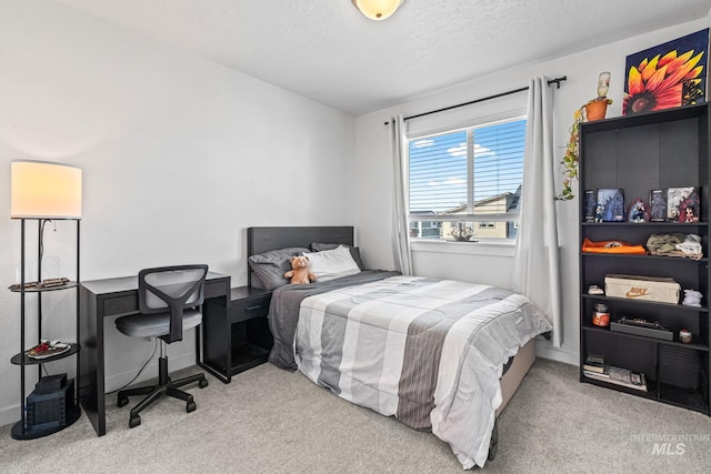 3084 N Network Ln, Boise, ID 83704 - bedroom featuring carpet floors and a textured ceiling