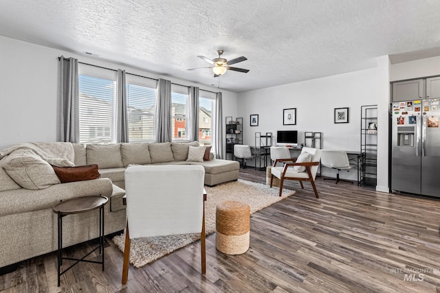 3084 N Network Ln, Boise, ID 83704 - living area featuring ceiling fan, a textured ceiling, and dark wood finished floors