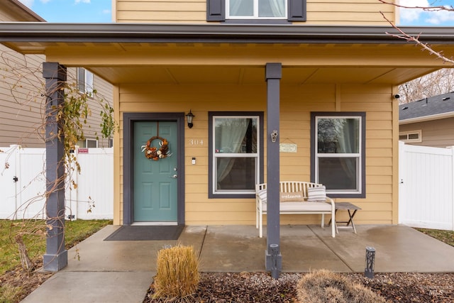 entrance to property with covered porch