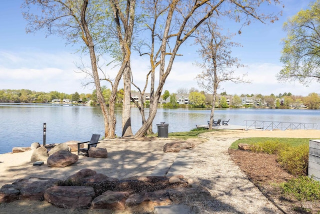 property view of water featuring a boat dock