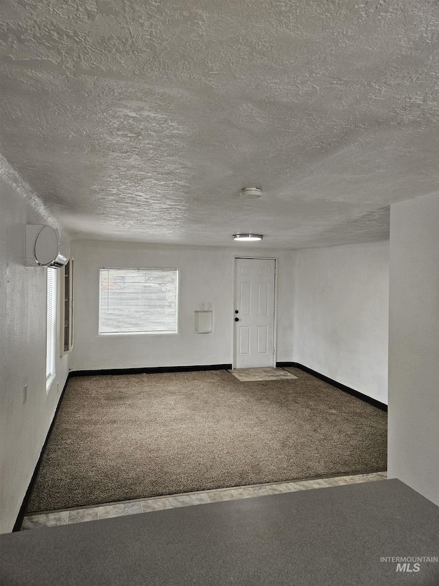 407 E Freeport St, Caldwell, ID 83605 - carpeted spare room with a textured ceiling and a smoke detector